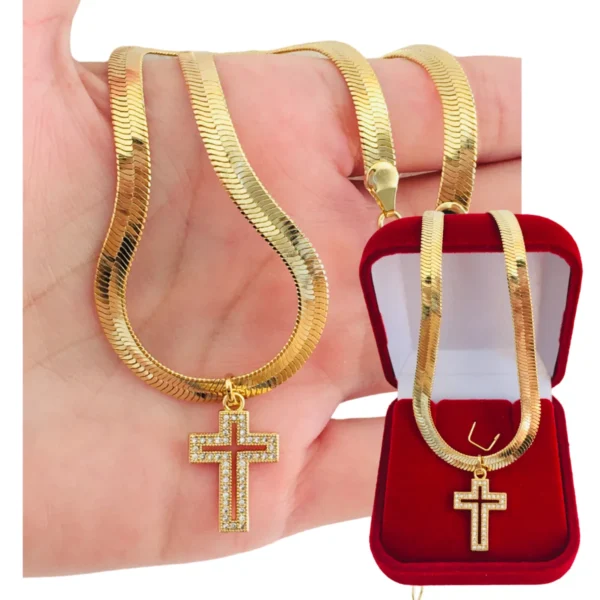 A "Choker Colar Feminino Gargantilha Fita Malha Pingente Cruz Zircônia Folheada a Ouro 18k" é uma peça única que mescla estilo e elegante. Com uma fita de malha que abraça o pescoço, esta gargantilha apresenta um pingente cruz adornado com zircônia, conferindo-lhe um toque refinado. Sua folheação a ouro 18k proporciona brilho e sofisticação. Essa semijoia é uma escolha versátil, perfeita para elevar qualquer look, seja casual ou formal. Ao combinar design moderno e elementos clássicos, esta gargantilha se destaca como uma expressão de moda e bom gosto, tornando-se uma adição encantadora à coleção de acessórios femininos.